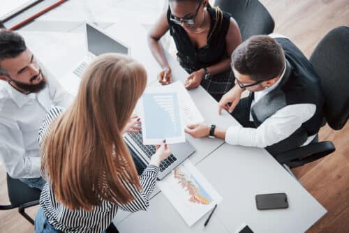 employees having a meeting to discuss it security services